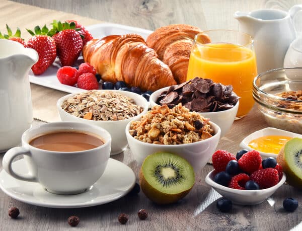 Private chef prepared continental breakfast with fresh pastries and fruit