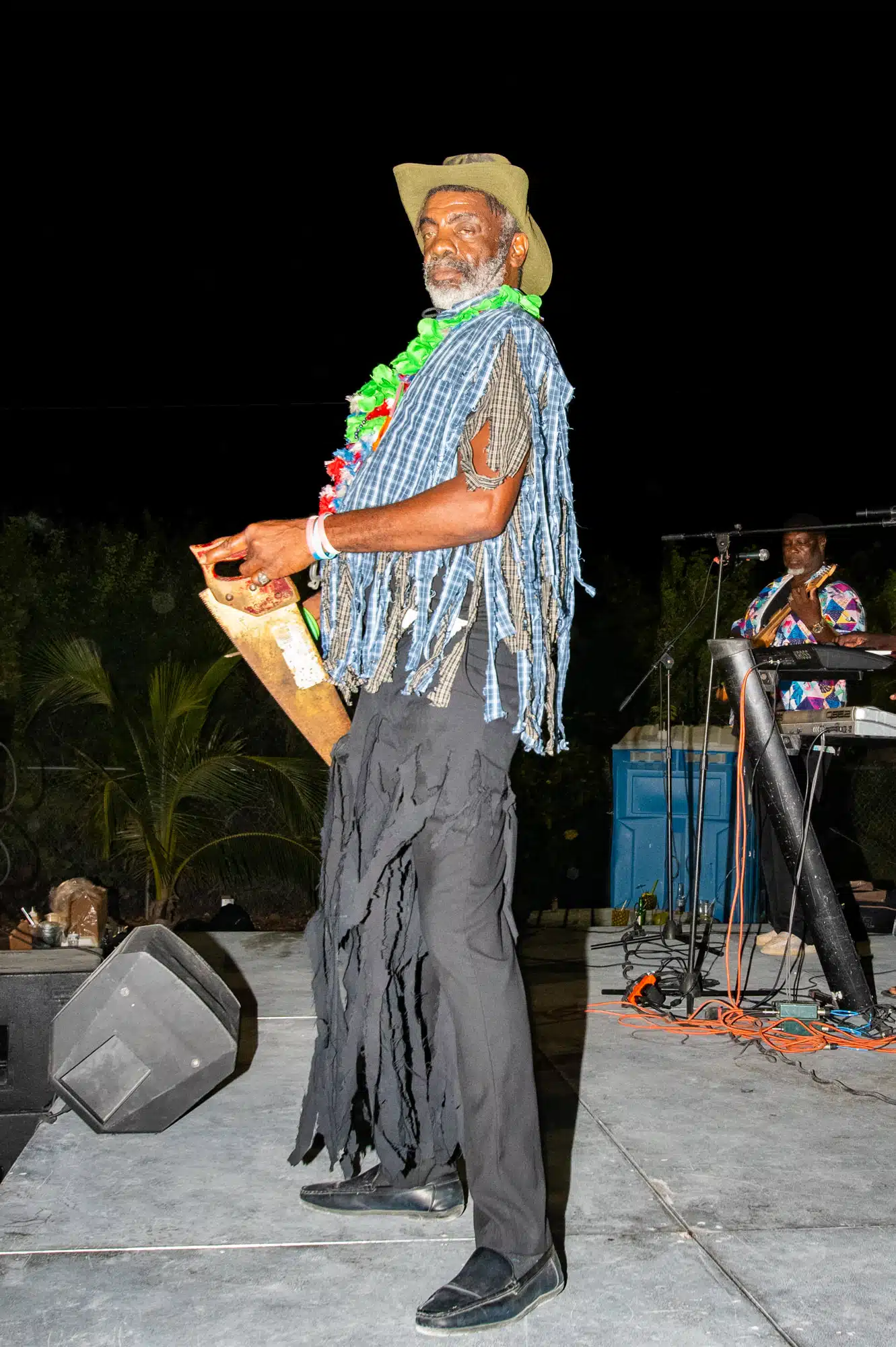 Local ripsaw musician at Fish Fry in Turks and Caicos